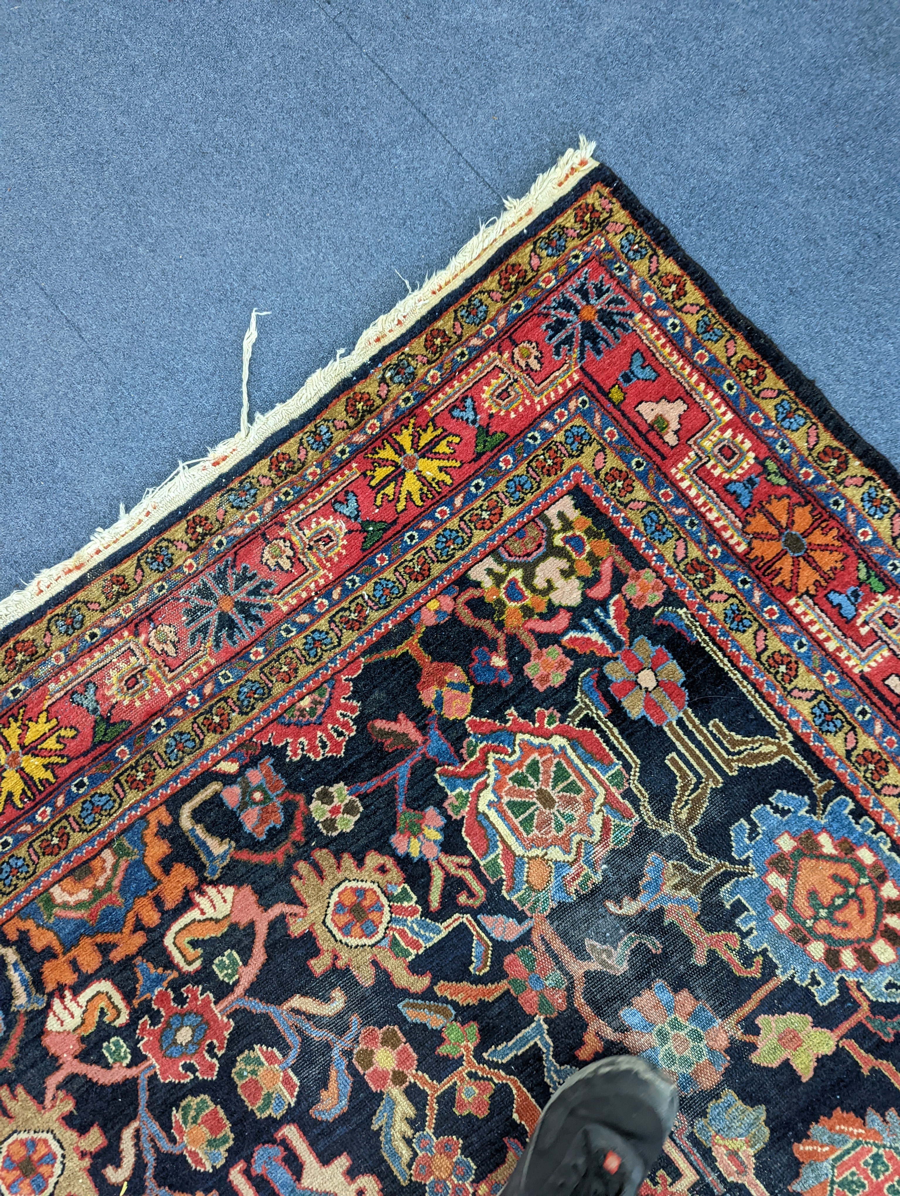 A Heriz / Moghal blue ground carpet, 340 x 206cm